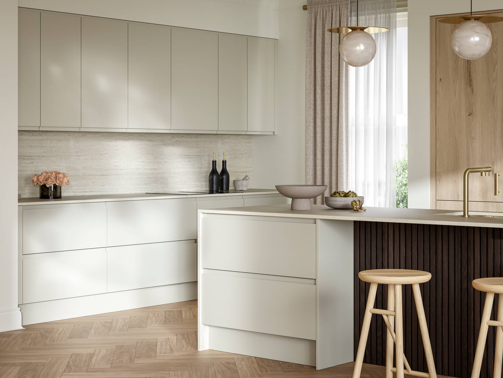 A bright and airy open-plan kitchen that incorporates Duxbury drawers and cabinets in Limestone, and Portobello units in Bosco. Combined with dark wood paneling on kitchen island bar.