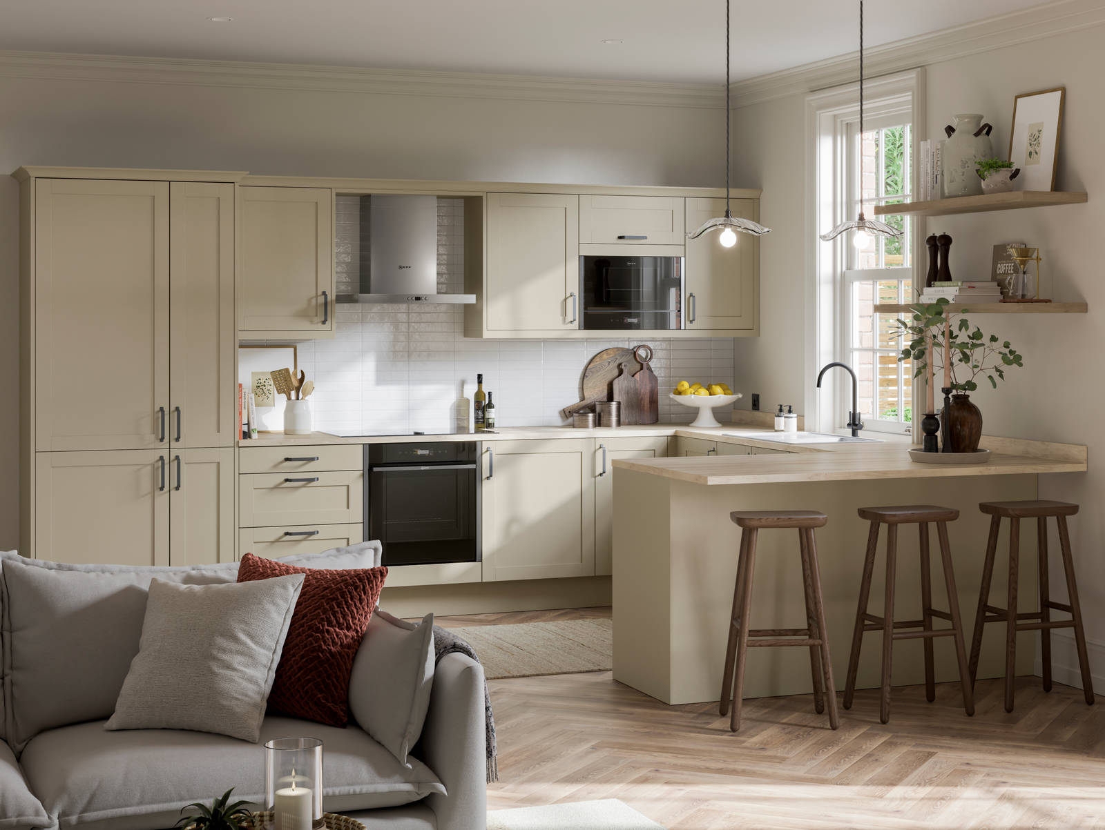 Tatton Sage from Magnet, a contemporary narrow frame shaker door, with a grey sofa in the foreground
