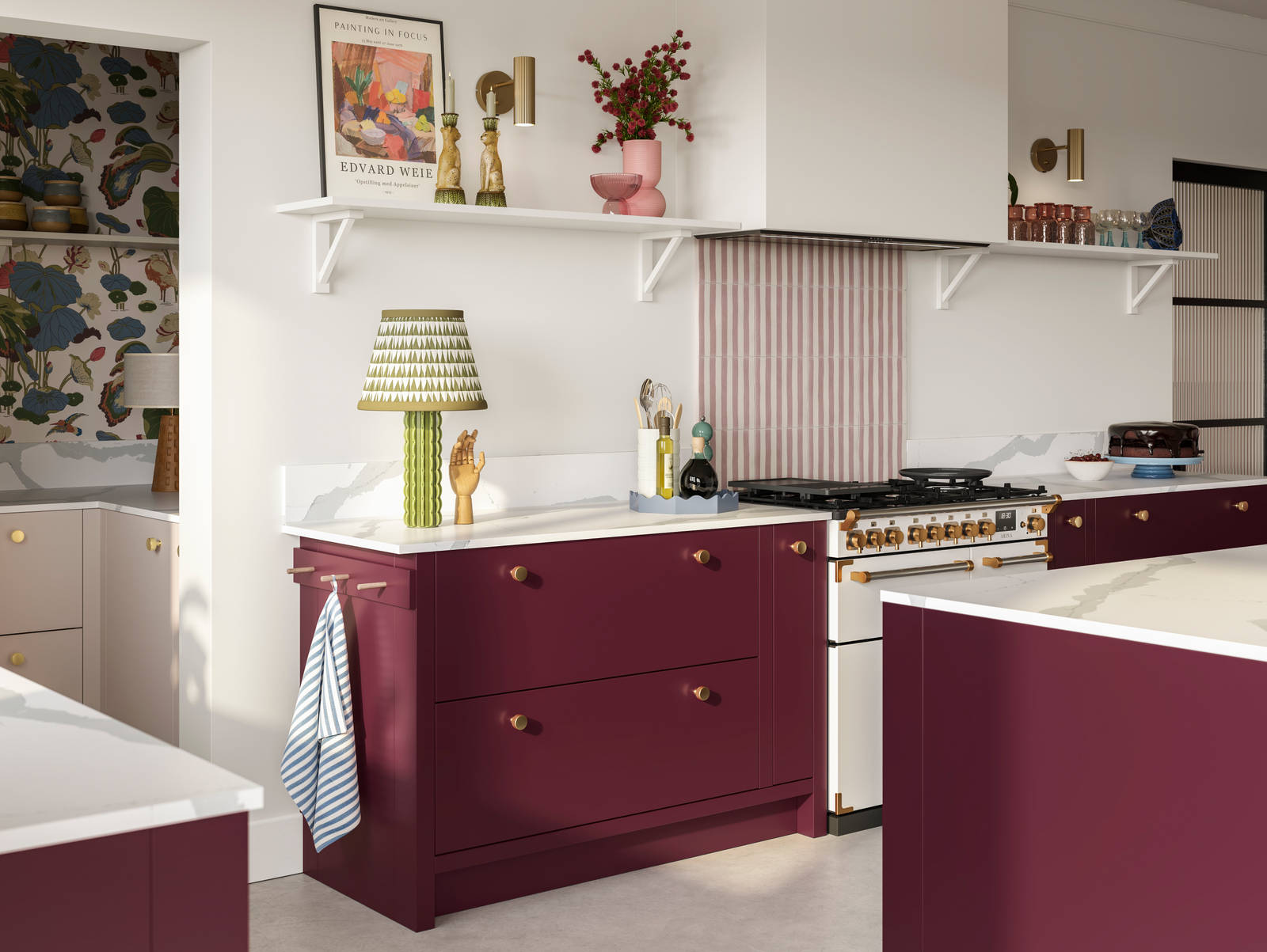 Modern slab front Soho Morello and Shell kitchen with kitchen island, Bianco calacatta worktop and upstand, brass knobs and open wall shelves holding eclectic decorations and glasses.