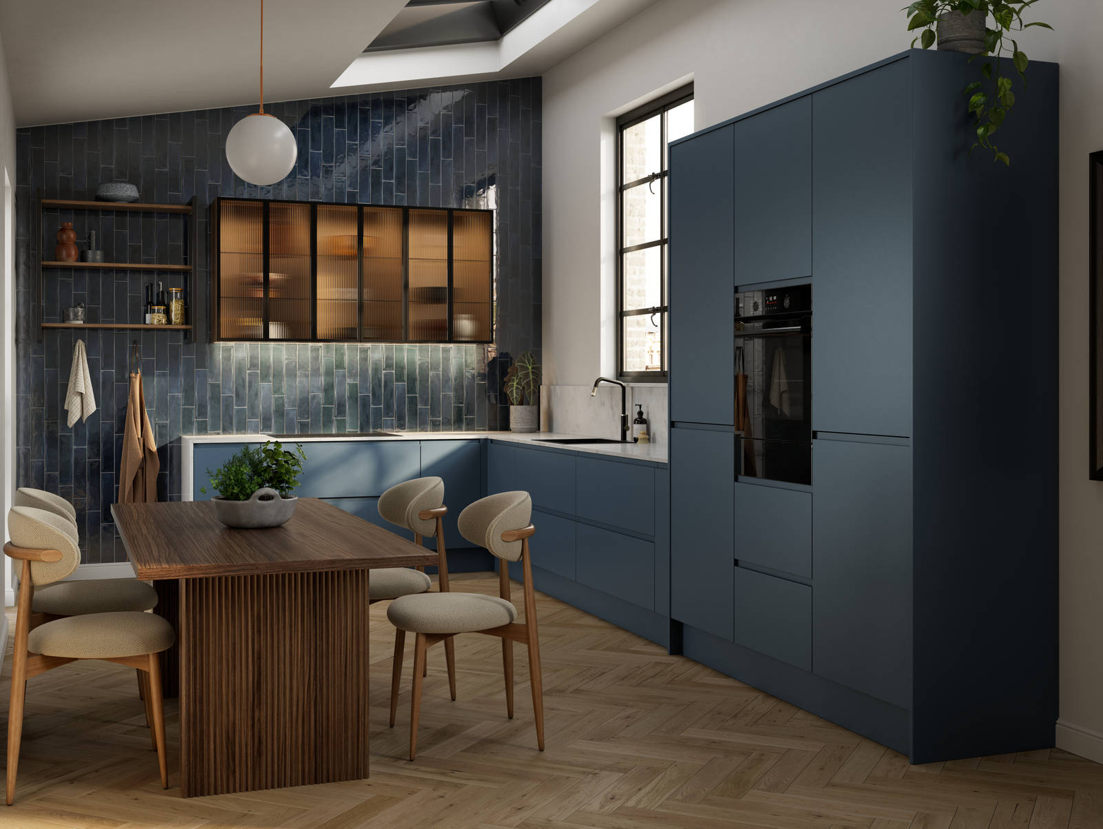 Contemporary and minimalist handleless kitchen with J-Pull door in dark blue shade Mineral Blue, with fluted glass vitrine wall cabinets and marbled worktop and matching upstand.
