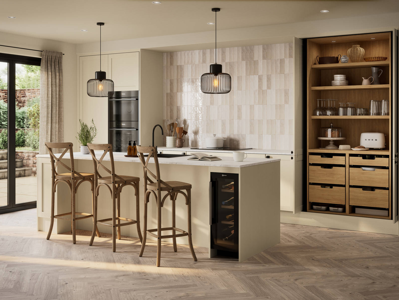 Contemporary Shaker kitchen Ambleside from Magnet in neutral shade Sand with black sink and tap in kitchen island, induction hob with extractor and tall cabinet pocket door larder, wine cooler in kitchen island.