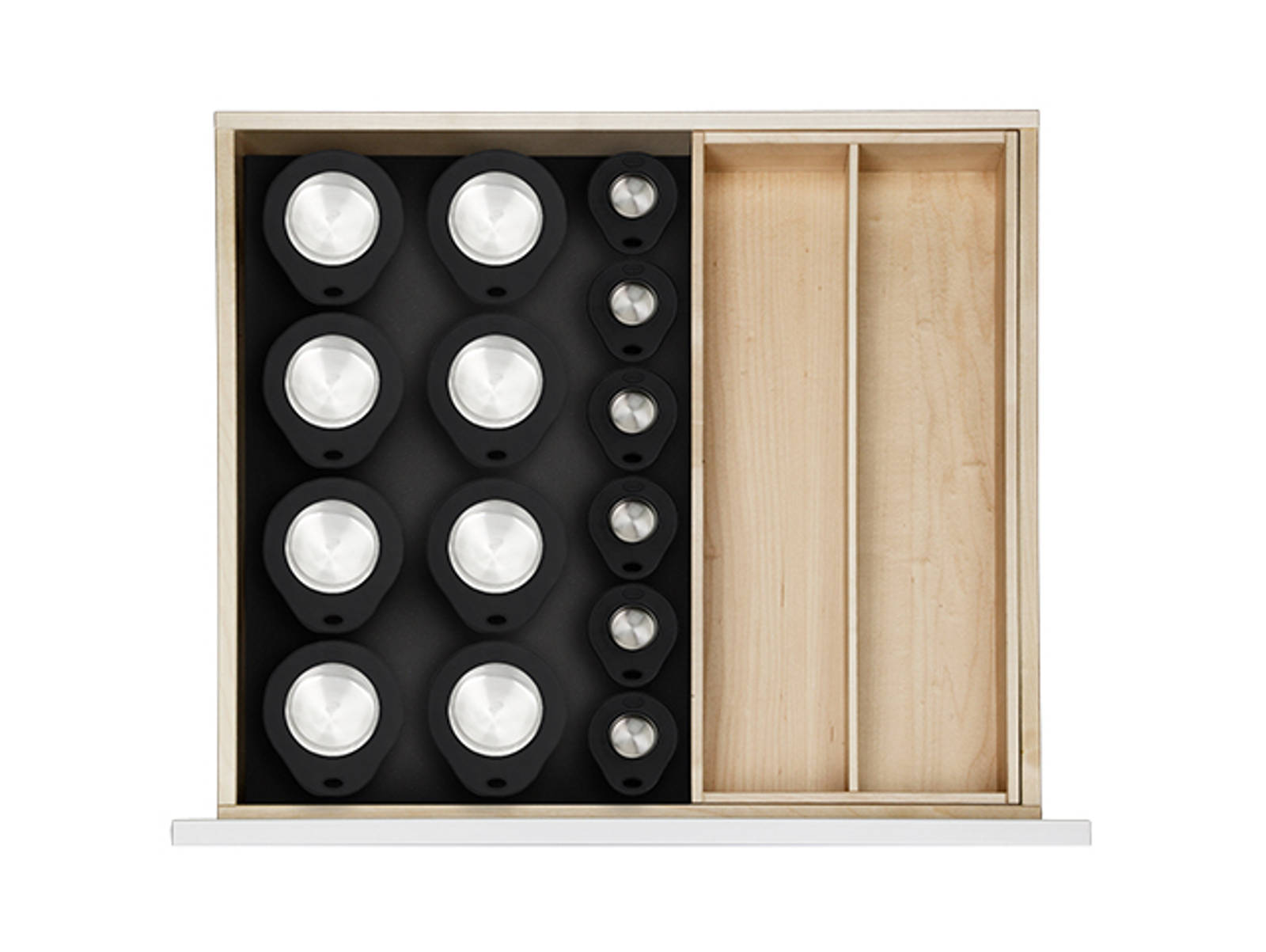 Låduppdelning med kryddburkar