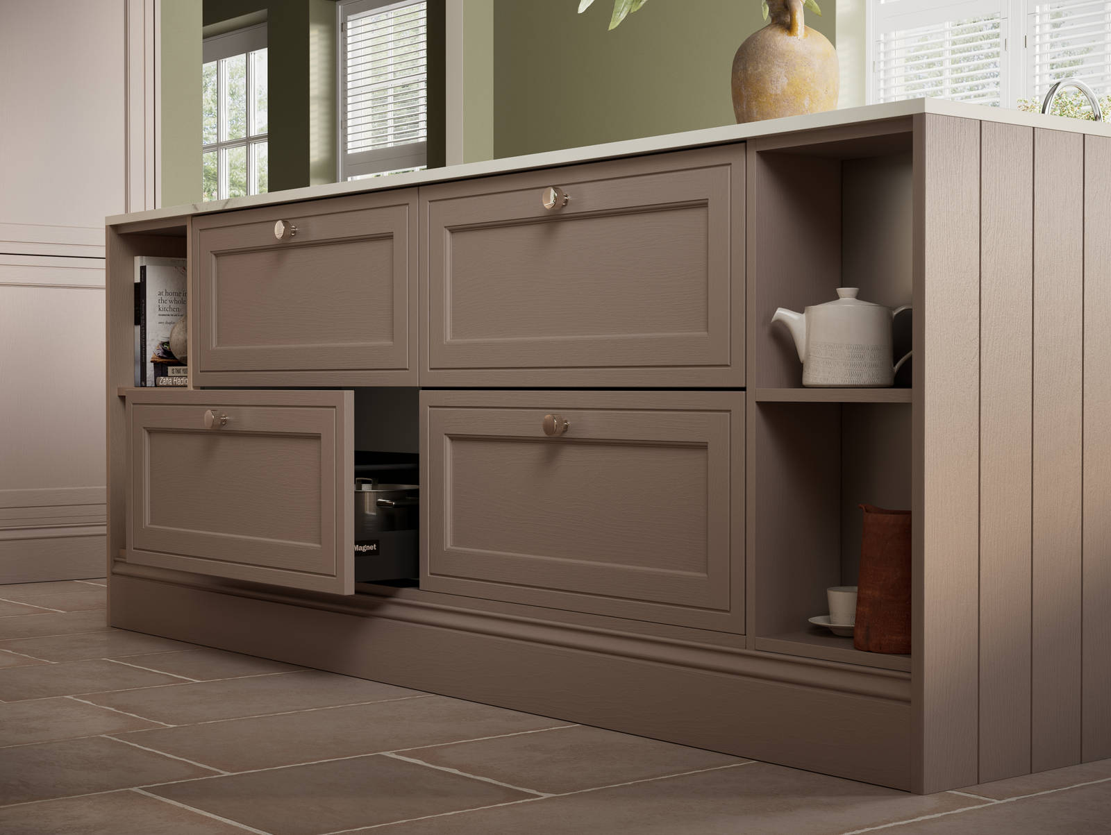 Close-up view of Shaker style painted wood grain Bewdley cabinet kitchen island with classic design steel knobs, open shelves and decorative splinth matching the Cornish Clay shade.