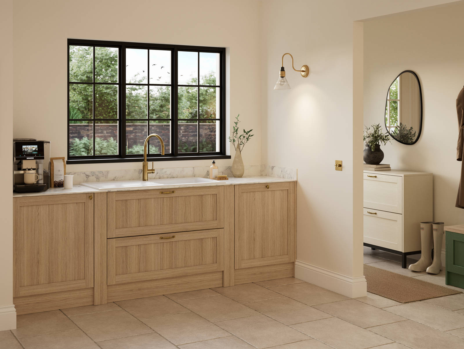 Traditional premium contemporary Shaker kitchen Ambleside in oak with brass knobs and handles, marbled worktop and upstand, brass tap and white ceramic sink.