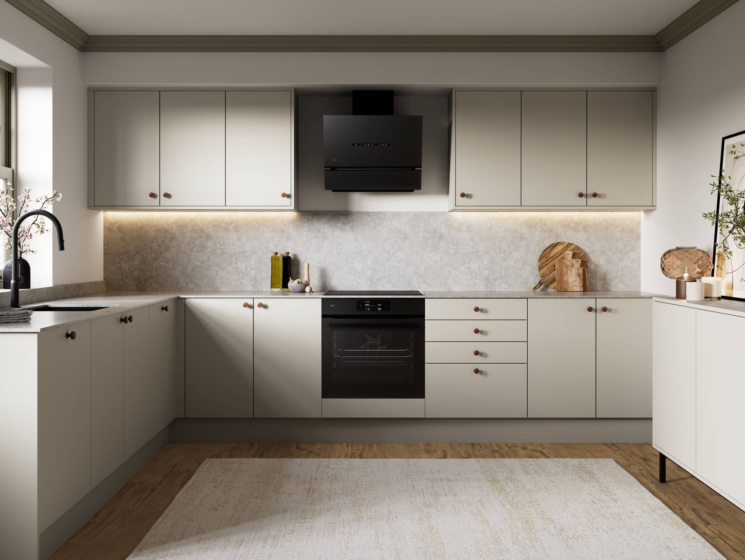 Modern slab kitchen Ascoli in neutral shade Limestone with brass knobs and black tap