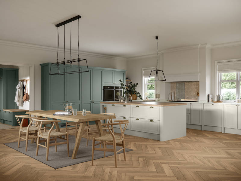 Ambleside Shaker kitchen in Moss and Limestone colours, featuring cup handles, and a spacious open-plan layout.
