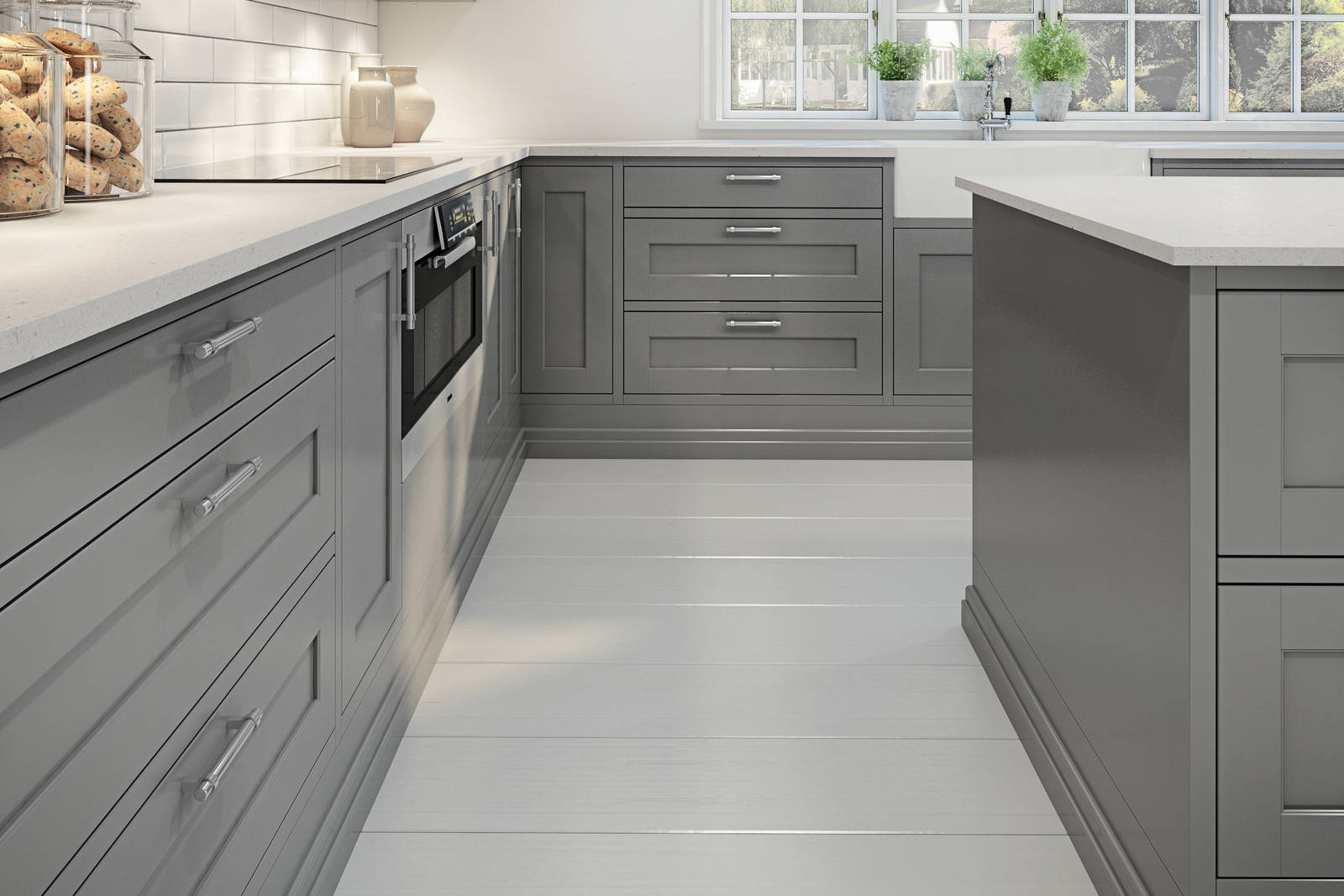 Grå kjøkken med stål håndtak