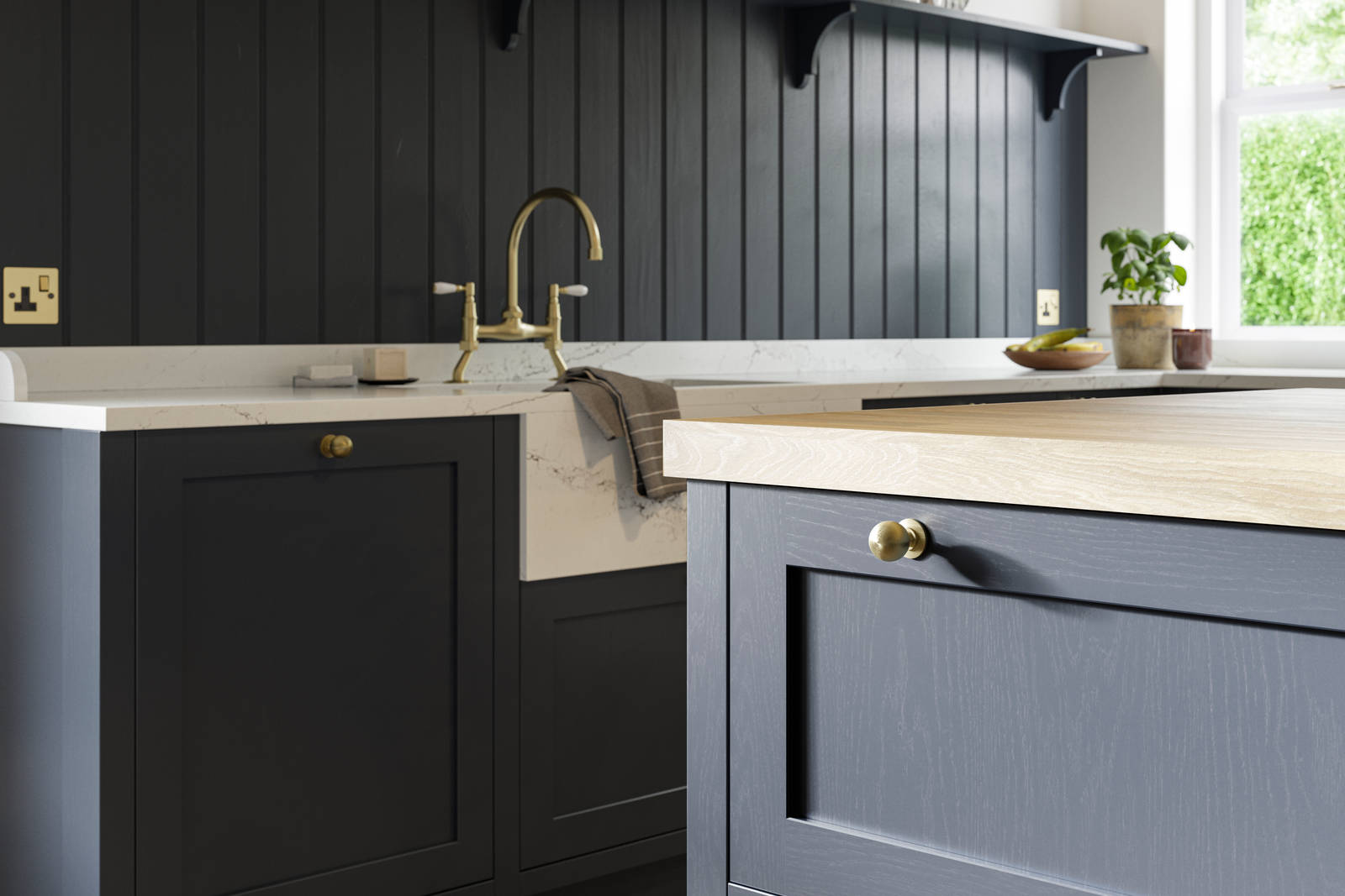 Closeup of dark blue Shaker kitchen Wardley, with painted timber finish and narrow framing. Paired with a brass kitchen tap and blue matching wall panelling.