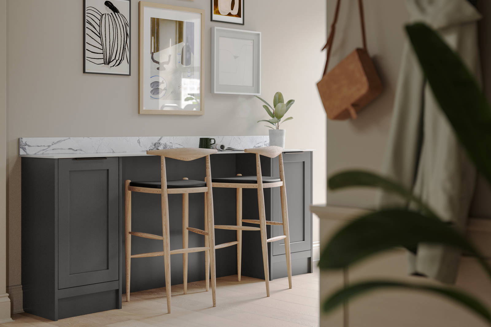 A dark grey Shaker bar sideboard with Charcoals cabinetry, paired with marble splashback and wooden high chairs.