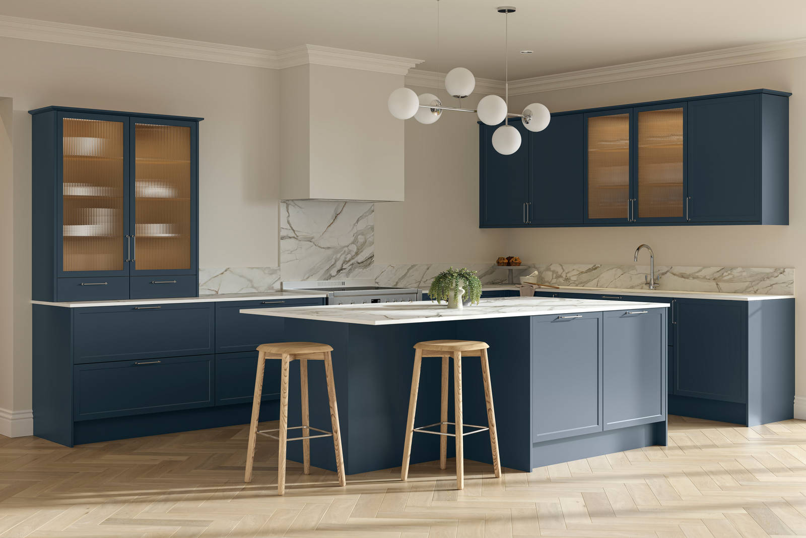 Modern Shaker kitchen Brunswick Voyage blue with white and grey marbled worktop and matching splashback, a kitchen island with breakfast bar and vitrine cabinets with fluted glass, and light wood herringbone flooring.