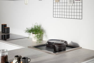 Luna Kitchen from Magnet. An affordable handless look with integrated J Pull doors for a stylish and modern look.