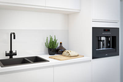 Luna Kitchen from Magnet. An affordable handless look with integrated J Pull doors for a stylish and modern look.
