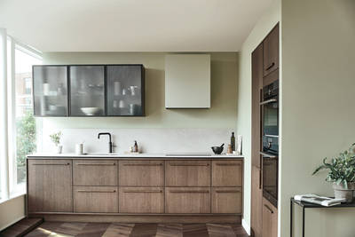 Nordic Nature. Modern wooden kitchen design with a Nordic influence. Featured floating worktops, a ribbed plinth and rounded end panels