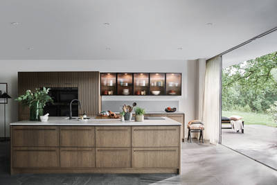 Nordic Nature. Modern wooden kitchen design with a Nordic influence. Featured floating worktops, a ribbed plinth and rounded end panels