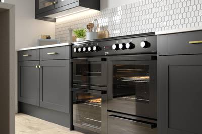 Close-op of Hobs in Tatton Midnight kitchen from Magnet, a contemporary dark blue narrow frame shaker door.