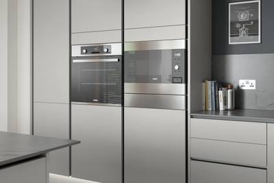 Integra Nova Grey by Magnet. Matt finished handless option with trim brushed in aluminum for a high end feel.
