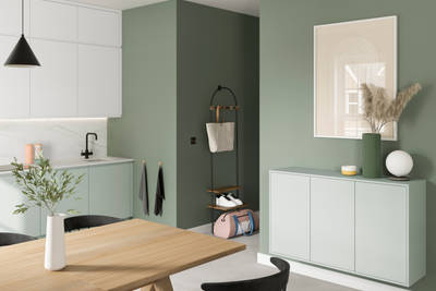 Minimalist kitchen design Luna, in the light and airy green shade Seagrass, with its integrated handle that gives any kitchen a beautiful, sleek finish.