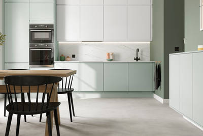 Minimalist kitchen design Luna, in the light and airy green shade Seagrass, with its integrated handle that gives any kitchen a beautiful, sleek finish.