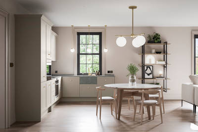 Light and nature tones open plan Dunham Pebble Path kitchen with dining table in light wood.