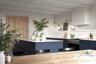 View of kitchen from dining room table, a modern and traditional kitchen decorated with green plats.