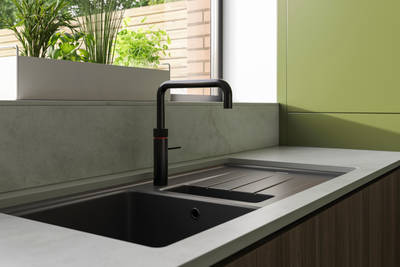 Integra Ascoli and Soho - a bright green and wood combination frameless slab door for a minimalist kitchen design.