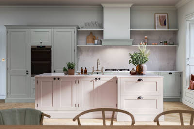 Traditional Shaker-style kitchen range featuring panelled doors with visible woodgrain and beading detail
