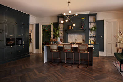 Traditional Shaker-style kitchen range featuring panelled doors with visible woodgrain and beading detail