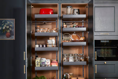 Ludlow, a traditional Shaker-style kitchen range in the shade Arboretum Green with straight kitchen larder pull out