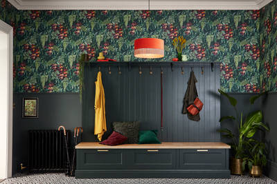 Entryway decorated with traditional Shaker-style cabinets featuring panelled doors with visible woodgrain and beading detail