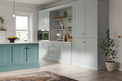 Traditional Shaker-style kitchen range featuring panelled doors with visible woodgrain and beading detail