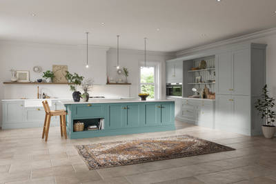 Traditional Shaker-style kitchen range in light grey with a blue kitchen island.