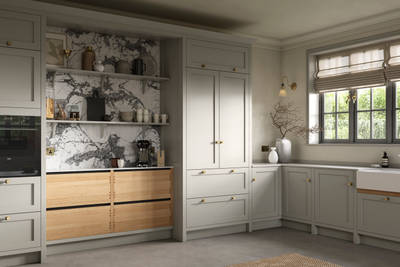 A neutral Shaker kitchen with Pebble and Nordic Craft cabinetry, with belfast sink.