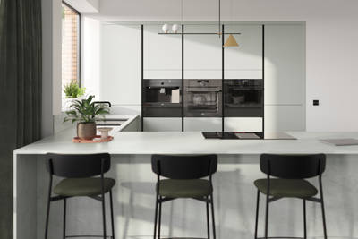 Integra Washed cotton is a frameless slab door with integrated handles in a smooth paint finish.