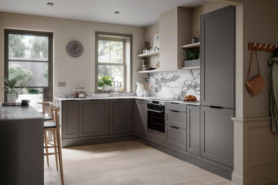 Shaker kitchen in dark grey shade Charcoals, matched with a marble worktop and backsplash.
