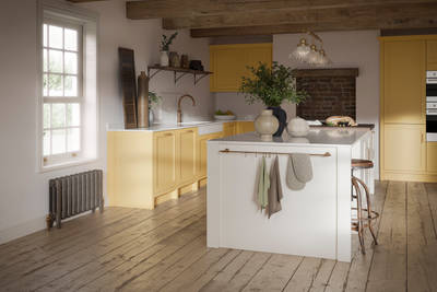 Alt text: Open floorplan shaker kitchen in the bright and beautiful yellow shade Harvest, paired with a kitchen island with matching frame door cabinets in the shade Limestone.