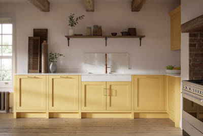 Shaker kitchen in the bright and beautiful yellow shade Harvest, paired with open wooden shelf and a marbled worktop.