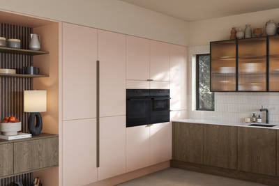 Soho cabinets in shade Chalk Blush, matched with fluted glass display cabinets and oak front cabinetry in Nordic Nature.