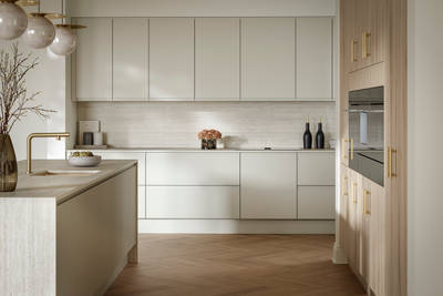A bright and airy open-plan kitchen that incorporates Duxbury drawers and cabinets in Limestone, and Portobello units in Bosco.
