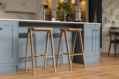 Traditional Shaker-style kitchen range featuring panelled doors with visible woodgrain and beading detail