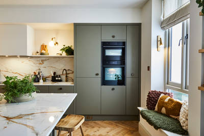 Modern slab Soho cabinets in the Balmoral colour, a soft beige green tone
