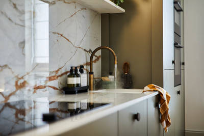 Modern slab Soho cabinets in the Balmoral colour, a soft beige green tone