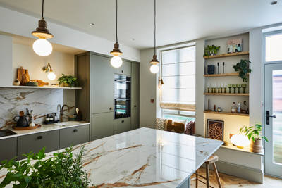 Modern slab Soho cabinets in the Balmoral colour, a soft beige green tone