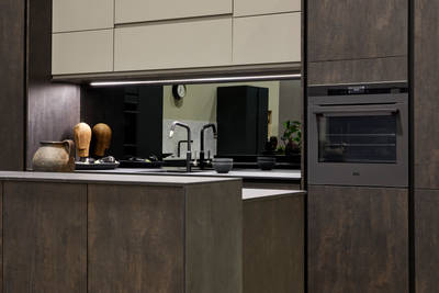 Contemporary clean lines and organic woodgrain texture in an elegant kitchen range designed for modern living.