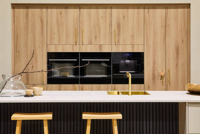 Contemporary clean lines and organic woodgrain texture in an elegant kitchen range designed for modern living.