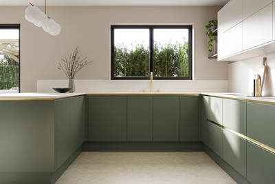 Painted handleless slab front Integra Soho from Magnet in shade Thyme paired with wall cabinets in shade Limestone, finished with brass details and plants.
