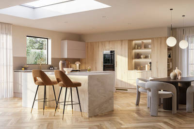 Modern Portobello Bosco kitchen with grey and brown designer chairs and Integra Soho Shell cabinetry.