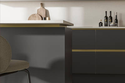 Modern and minimalist Integra Soho Charcoal kitchen, a frameless slab door with integrated handles in a smooth paint finish.