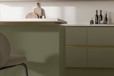 Modern and minimalist Integra Soho Misty Moors kitchen, a frameless slab door with integrated handles in a smooth paint finish.