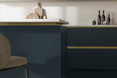Modern and minimalist Integra Soho Voyage Blue kitchen, a frameless slab door with integrated handles in a smooth paint finish.