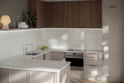Modern Shaker kitchen Brunswick in light shade Limestone with Nordic Oak wall cabinets, matched with oak handles, compact Smeg induction hob, worktop and matching splashback in Silestone quartz Nolita.